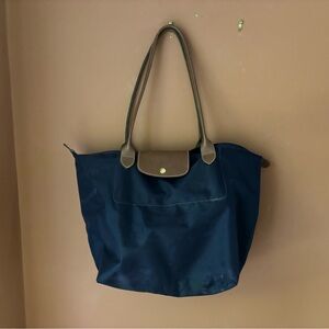 Long champ tote bag in a purple eggplant color